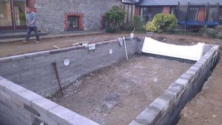 Preparing the blockwork wall for rendering your in-ground pool